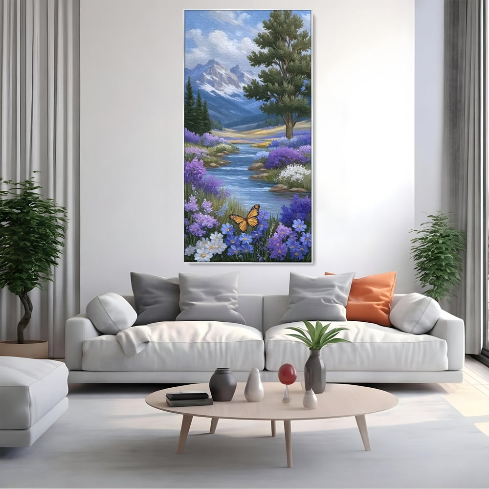 Tablou canvas cu tablou pictura peisaj montan cu rau si flori, in rama de aluminiu argintiu, pe perete intr-un living